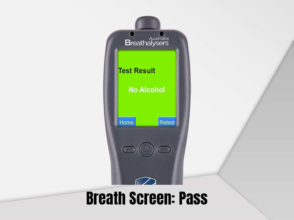 A breathalyser with a pass result on the screen
