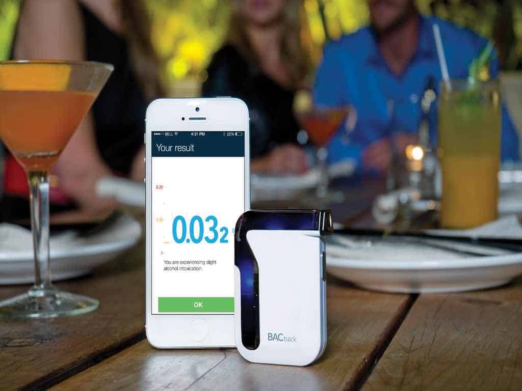 The BACtrack Mobile Pro breathalyser connected to a smartphone app