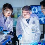 Three lab professionals testing drug test samples