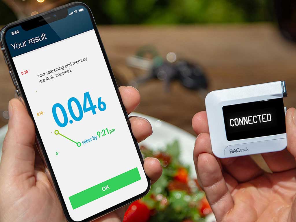 A small breathalyser that connects to a smartphone